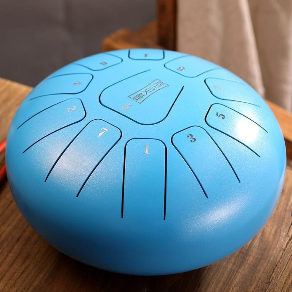 Light blue 8-inch Square Steel Tongue Drum with numbered sections and 11 notes in F key