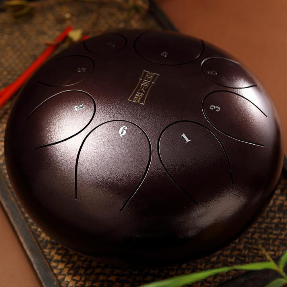 Dark metallic tongue drum with numbered zones, 8-Tone D Key, 10 Inch instrument
