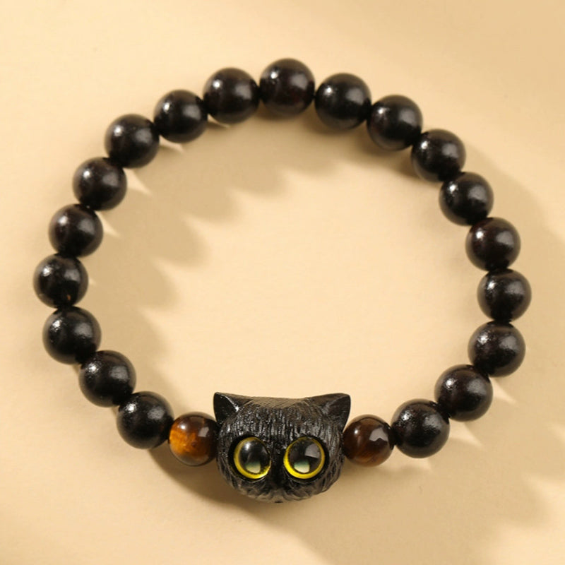 Bracelet tête de chat en bois d'ébène 8 mm pour la paix et l'équilibre