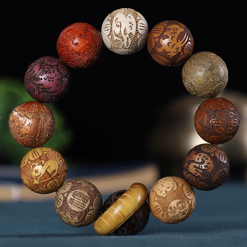 Bracelet zodiaque chinois en bois de rose avec pièce de cuivre sculptée pour le calme