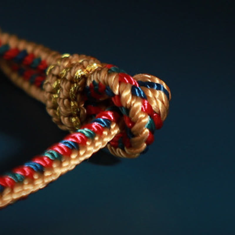 Bracelet de protection tibétain fait main en fil rouge