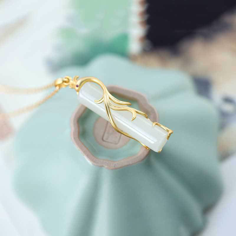 Collier pendentif dragon en jade blanc et cuivre pour la protection