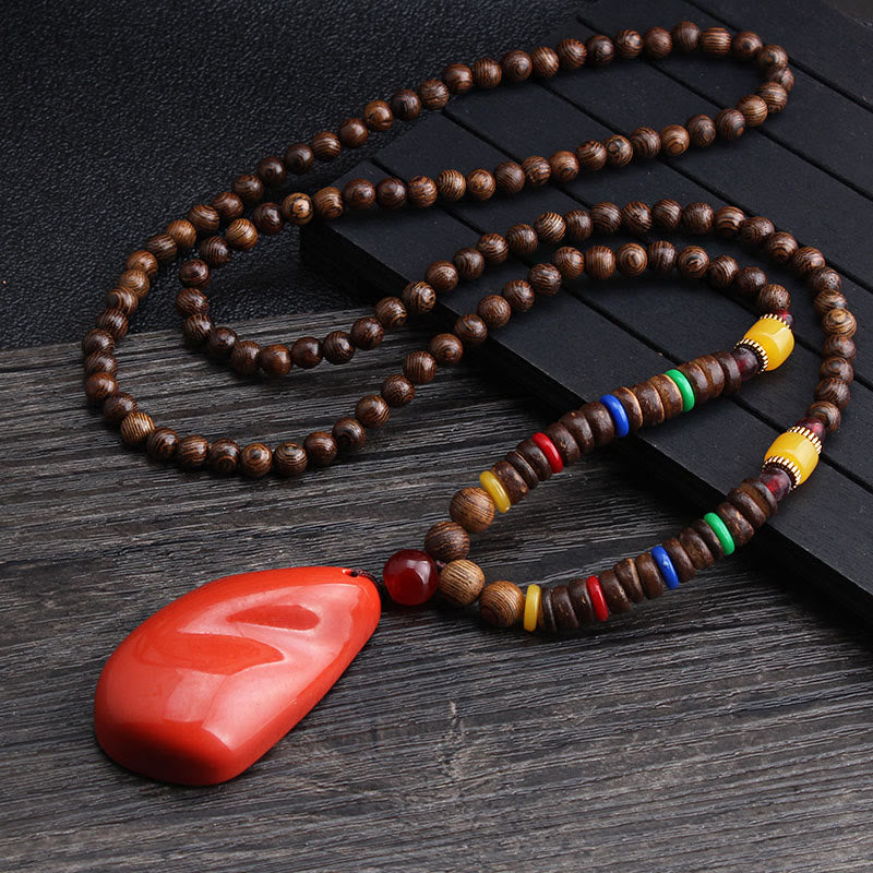 Collier d'équilibre en bois de wengé et agate pour la paix et la protection