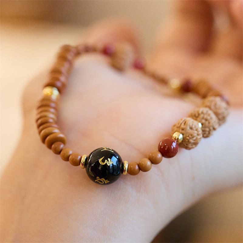 Bracelet Om Mani Padme Hum Graine de Bodhi et Onyx Noir