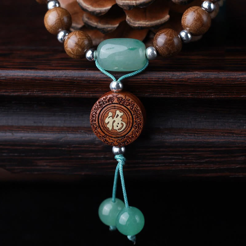 Bracelet de protection Om Mani Padme Hum en bois d'Abelia Biflora de 8 mm