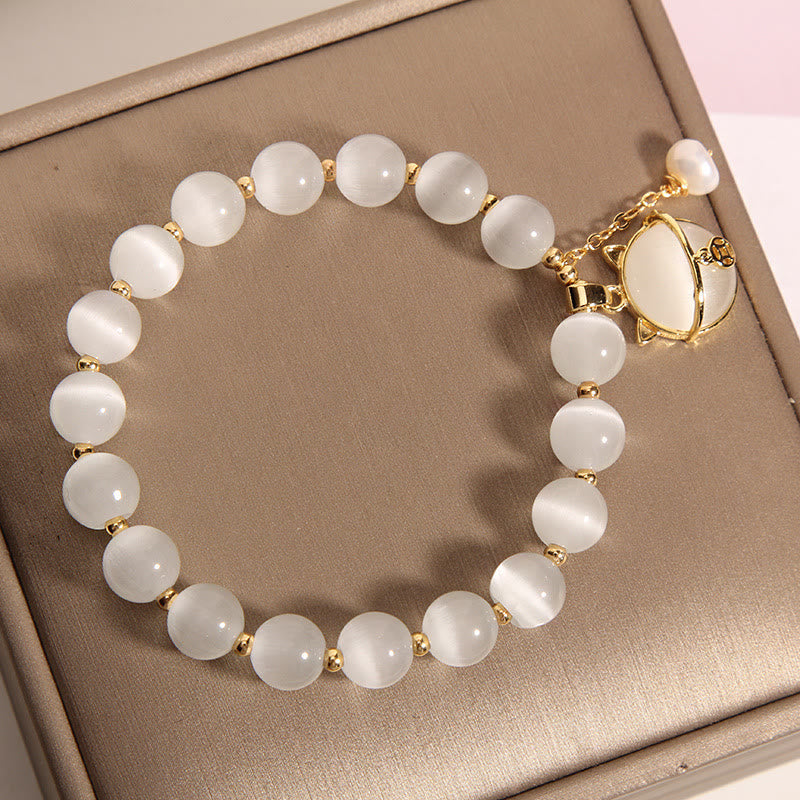 Bracelet à breloques en perles œil de chat de 8 mm pour le calme et la paix