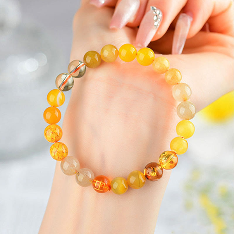 Bracelet en agate jaune des cinq éléments de 8 mm pour l'équilibre et la prospérité