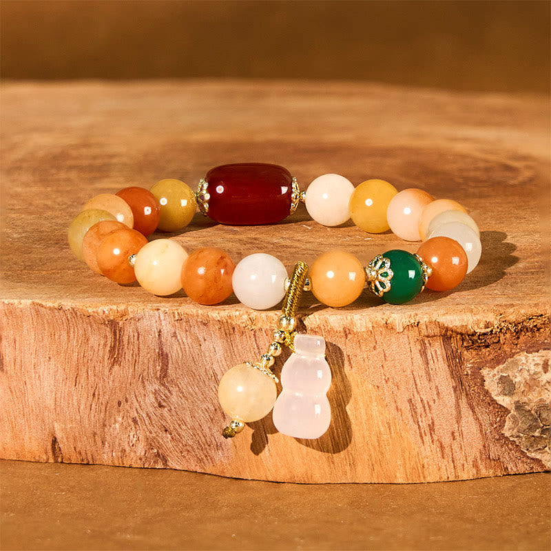 Bracelet en jade de soie dorée de 8 mm pour la richesse et la chance