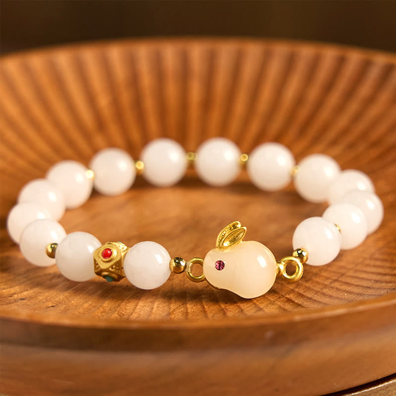 Bracelet porte-bonheur en jade de soie dorée de 8 mm avec breloque lapin