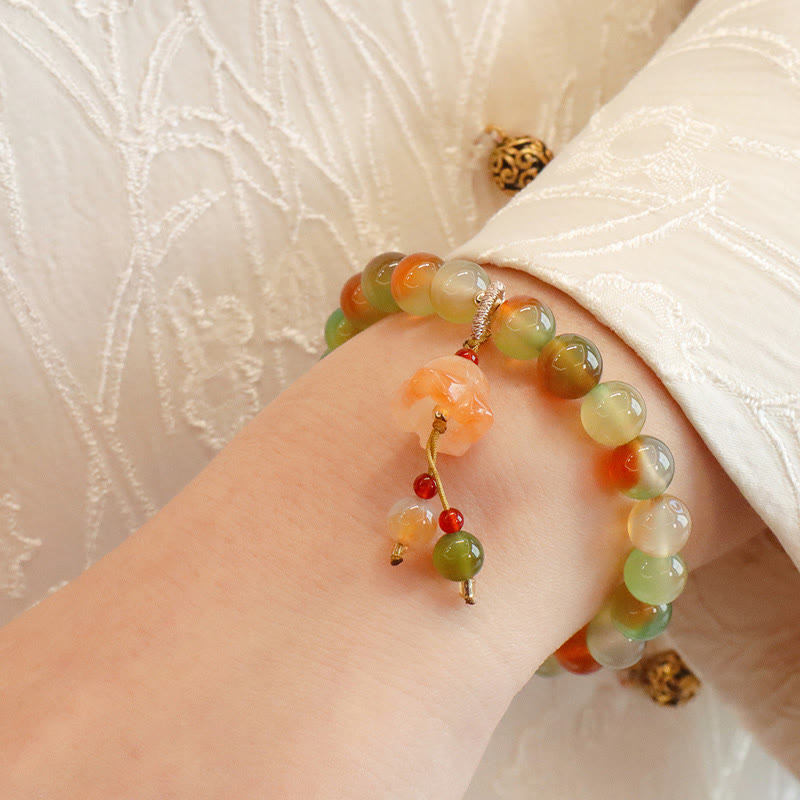 Bracelet boucle de paix en agate paon et papillon de 8 mm