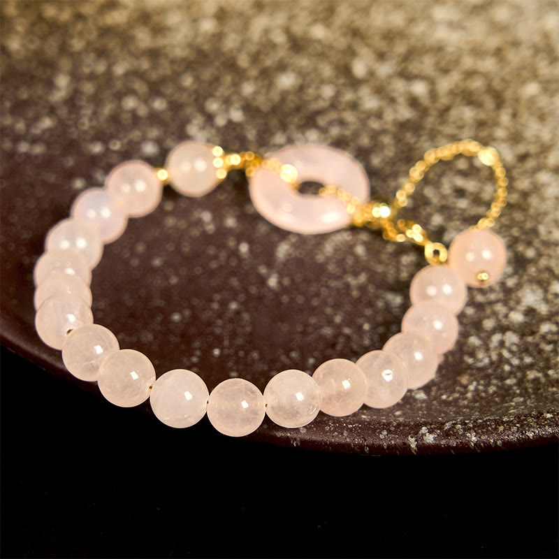 Bracelet en cristal rose de 8 mm avec boucle de paix