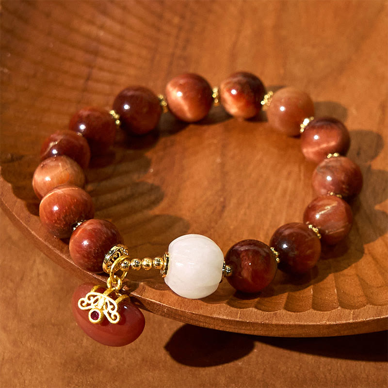 Bracelet œil de tigre rouge 8 mm pour la protection et l'équilibre