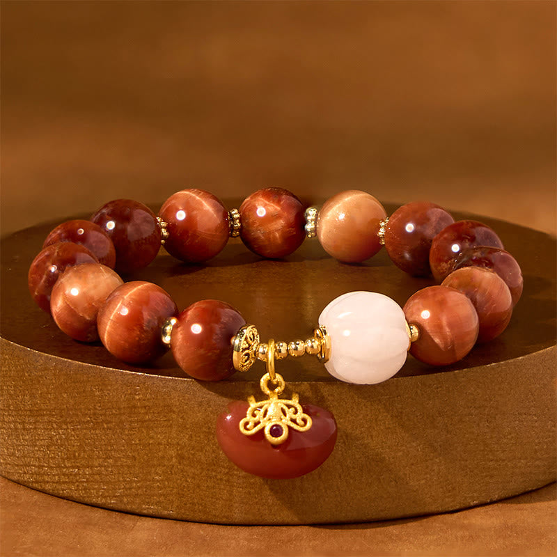 Bracelet Calme Citrouille Oeil de Tigre Rouge 8 mm