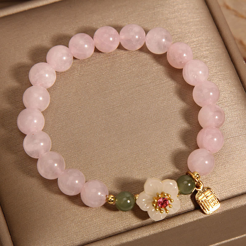 Bracelet de relation Fu en quartz rose 8 mm avec fleur de pêcher