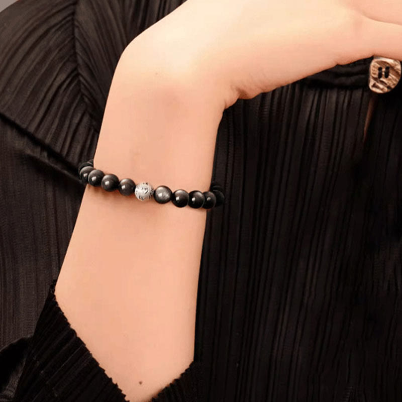 Bracelet Om Mani Padme Hum en obsidienne argentée brillante de 8 mm