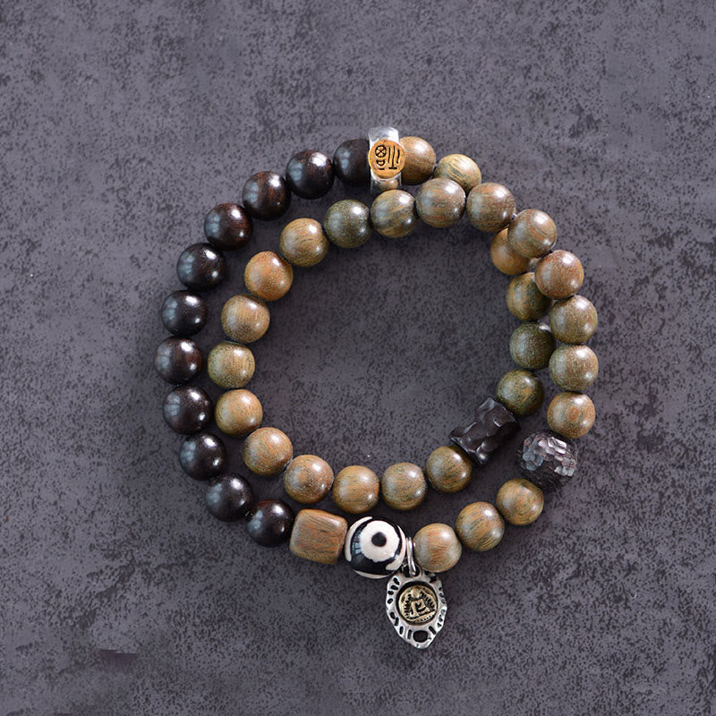 Bracelet spirituel tibétain en ébène et bois de santal vert de 8 mm