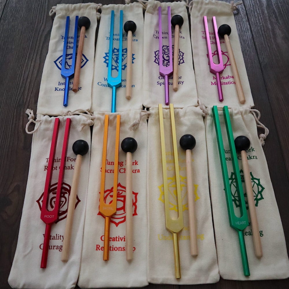 Colorful Chakra Tuning Forks with protective pouches for healing and BioField therapy