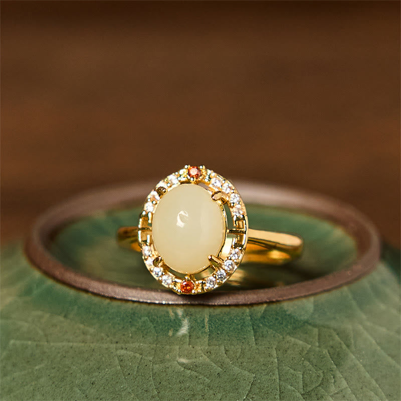 Bague porte-bonheur en jade Hetian 8 x 10 mm avec zircone en cuivre