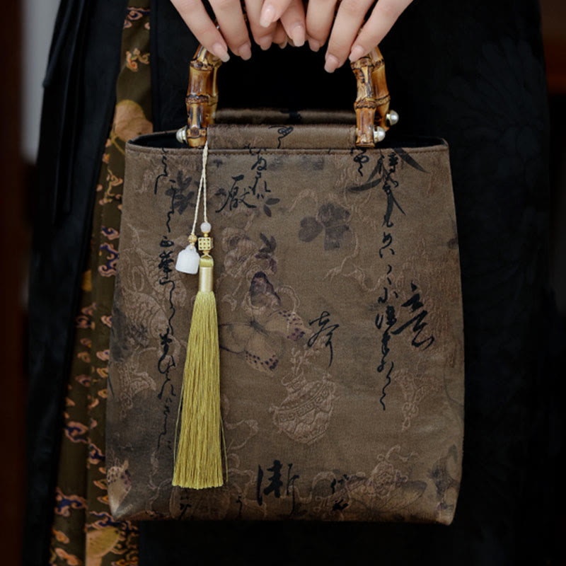 Sac à main en bambou avec motif papillon et poisson koï et poignées en jade