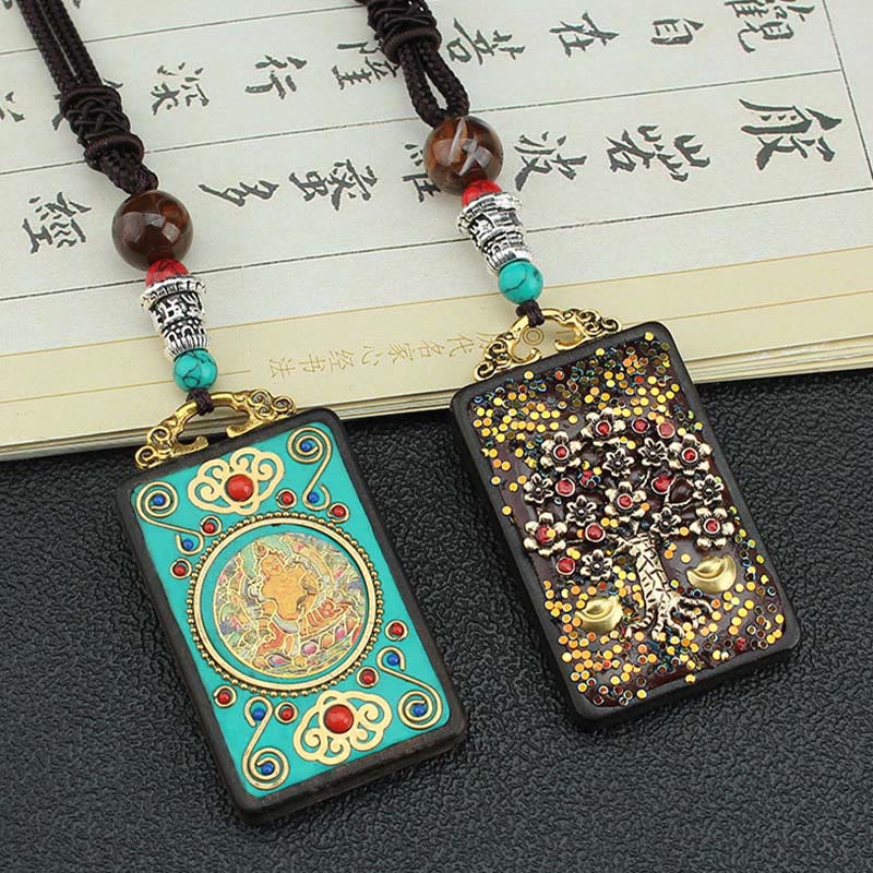 Collier spirituel en ébène avec dieux de la richesse et phénix doré