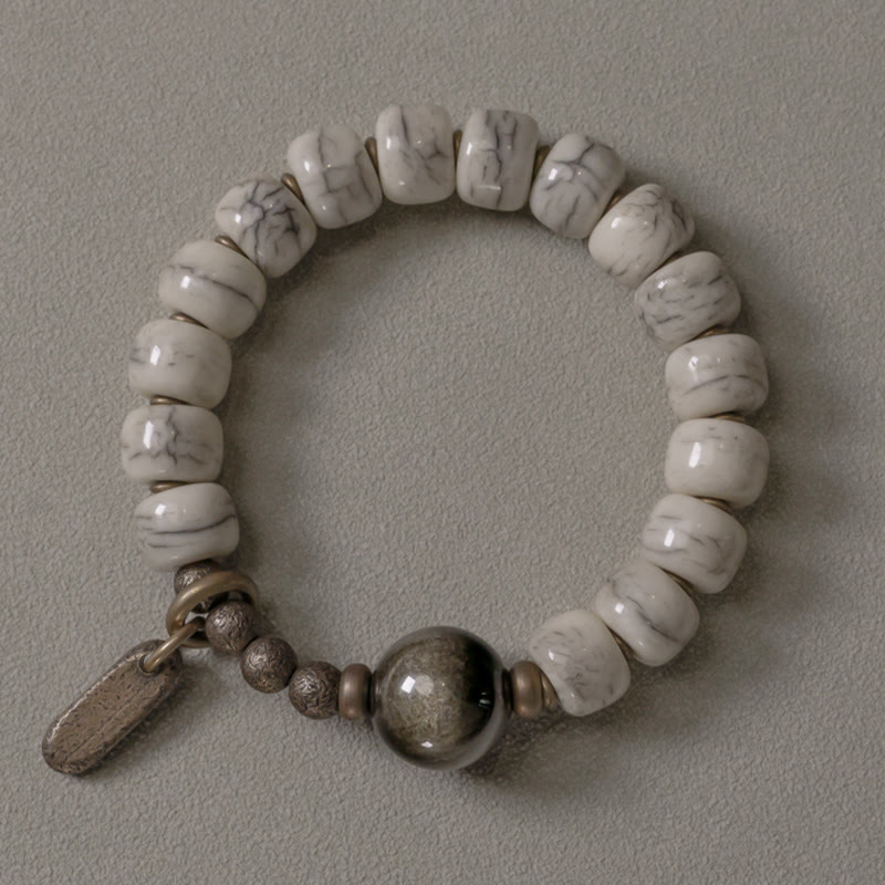 Bracelet unisexe en obsidienne dorée et os de yak