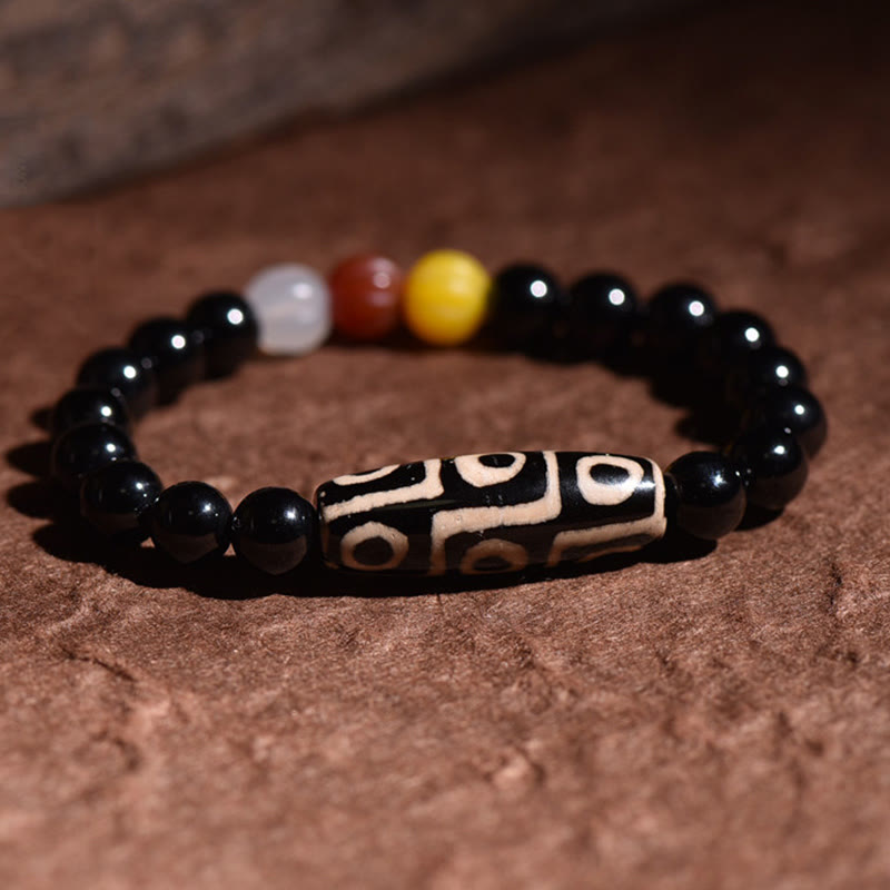 Bracelet de richesse spirituelle en perles dzi naturelles à neuf yeux