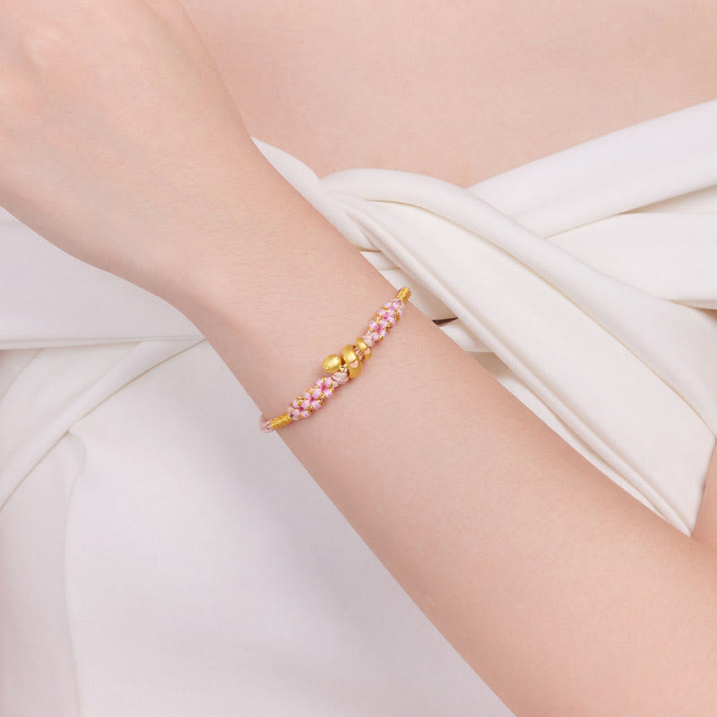 Bracelet porte-bonheur en corde rose serpent en or 999