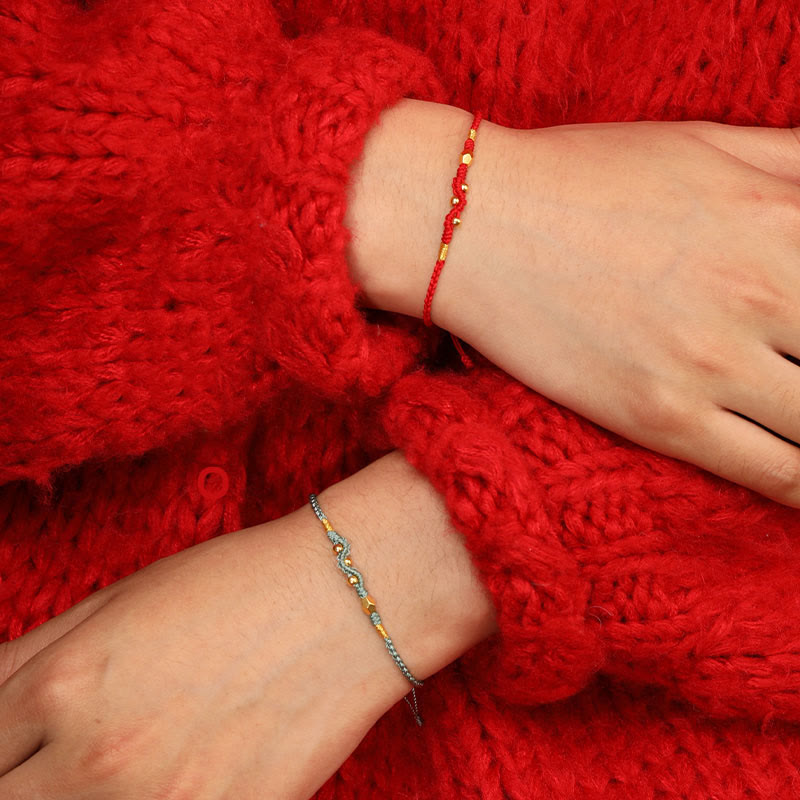 Bracelet de protection serpent en or 999 avec fil rouge