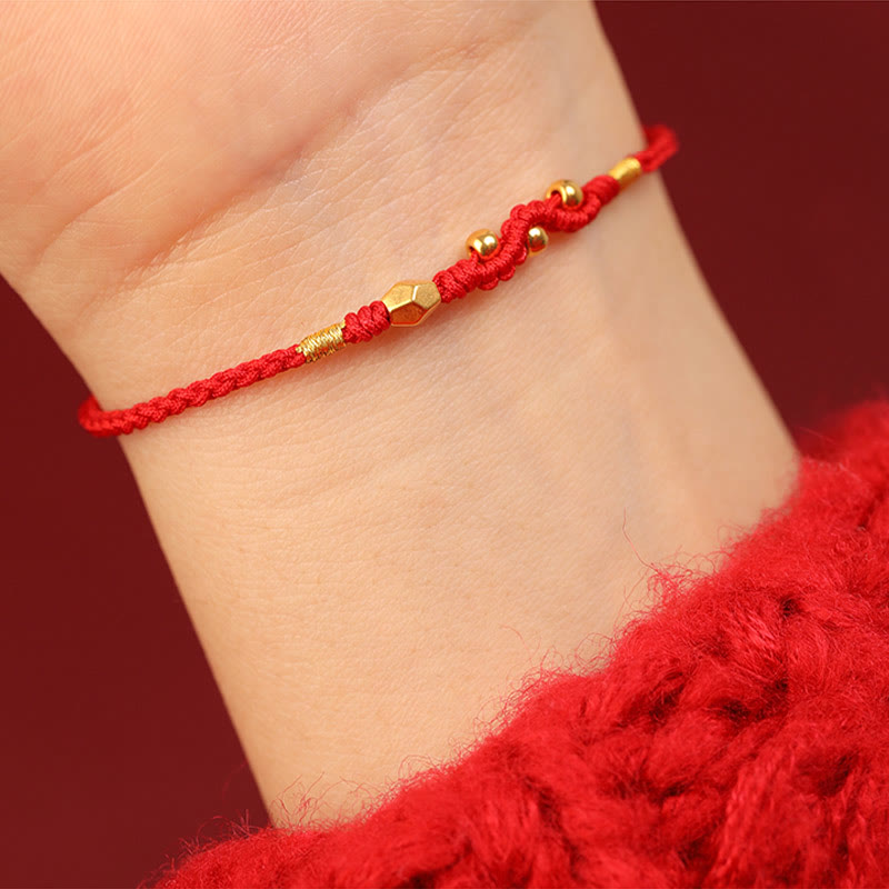 Bracelet de protection serpent en or 999 avec fil rouge