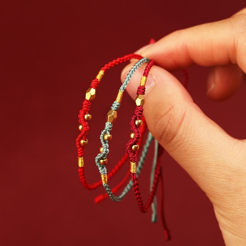 Bracelet de protection serpent en or 999 avec fil rouge