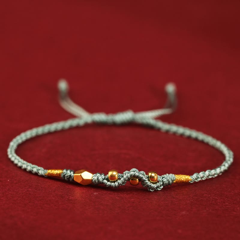 Bracelet de protection serpent en or 999 avec fil rouge