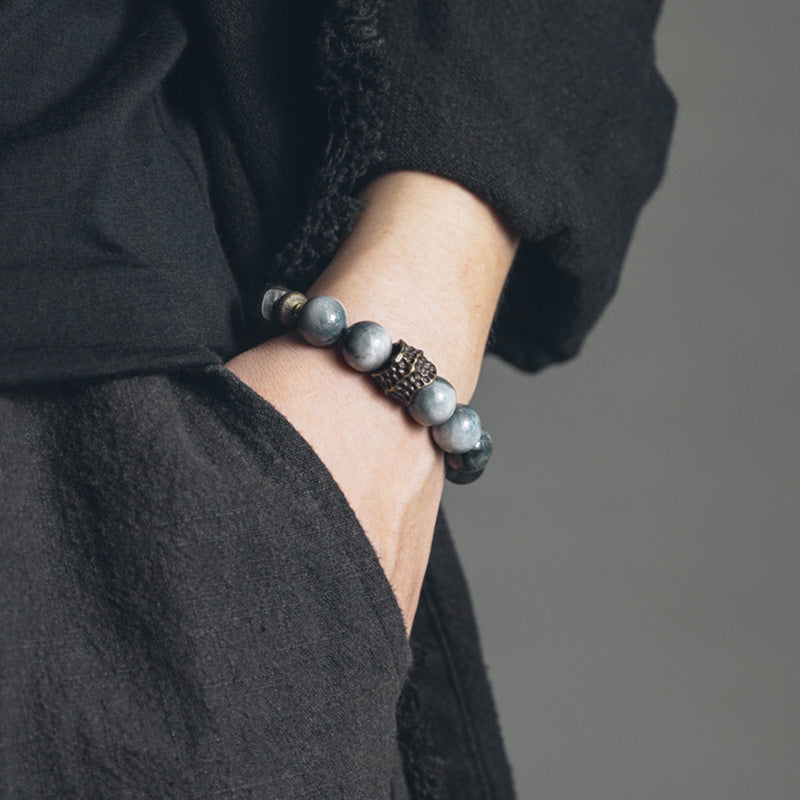 Bracelet couple en pierre œil d'aigle avec bois d'ébène et cuivre