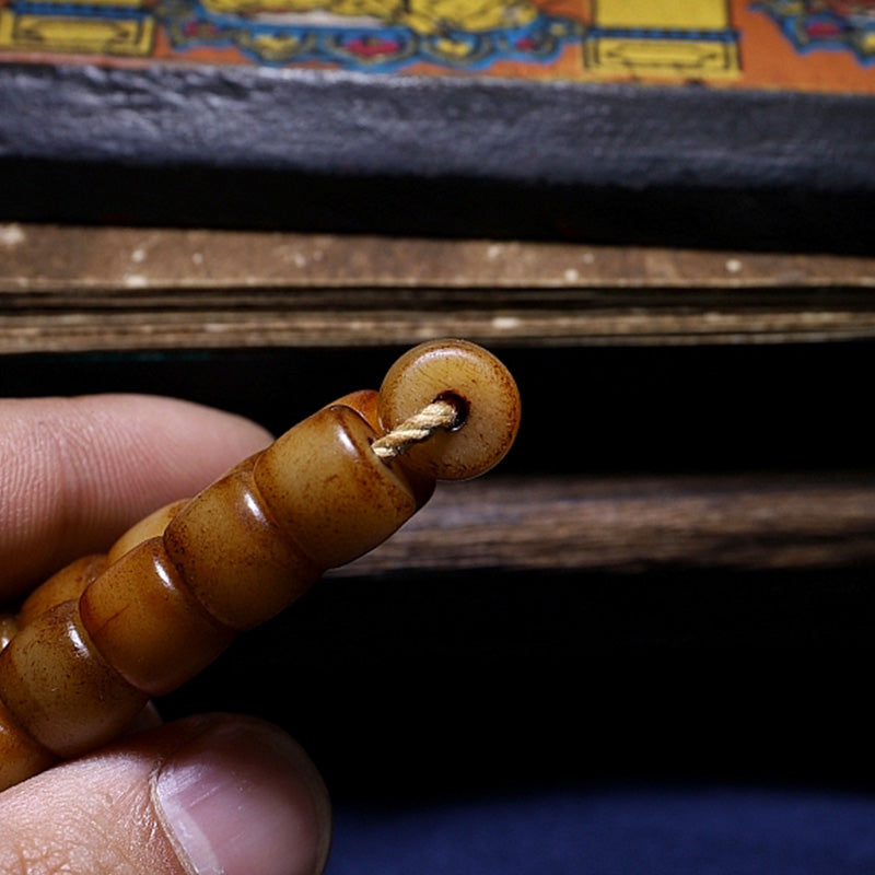 Bracelet Mala en os de yak et ambre à 108 perles pour l'équilibre