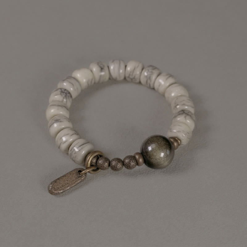 Bracelet unisexe en obsidienne dorée et os de yak