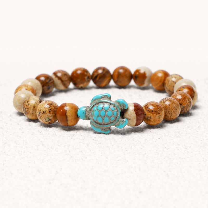 Bracelet turquoise de 8 mm avec breloque tortue de mer