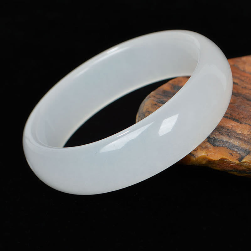 Bracelet jonc en jade et soie dorée 58 mm pour la richesse et la chance