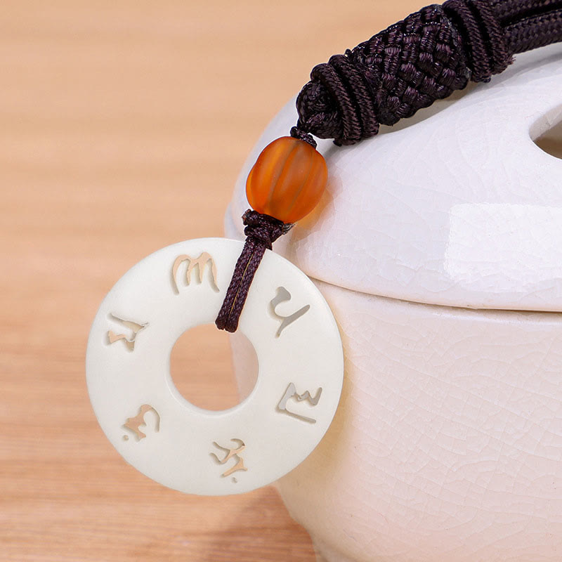 Collier de protection Om Mani Padme Hum en fruit ivoire 66 cm