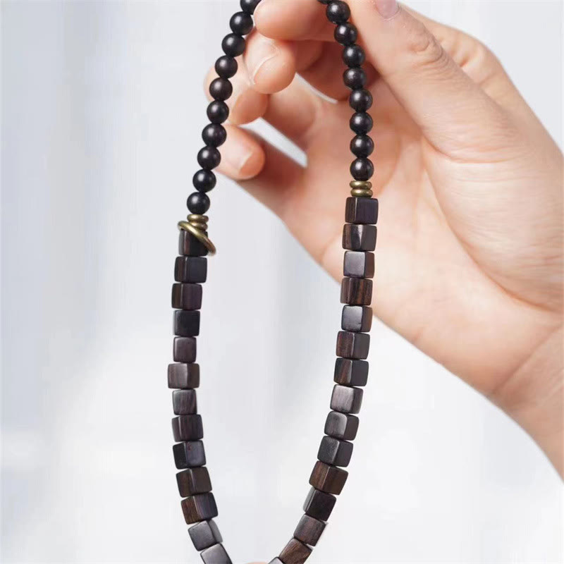 Bracelet spirituel double tour en bois d'ébène du Tibet pour la paix