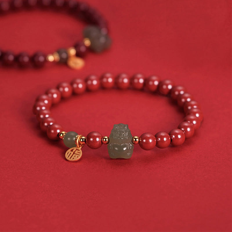 Sterling Silver Dragon Bracelet with Cinnabar & Jade Charms