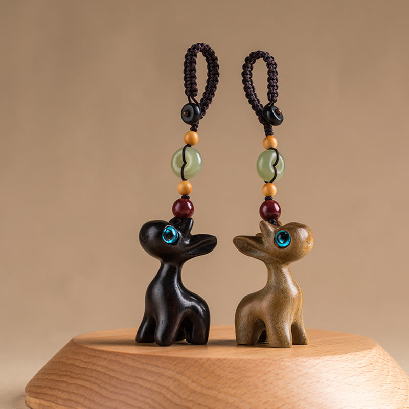 Porte-clés avec boucle de paix en bois de santal vert et ébène