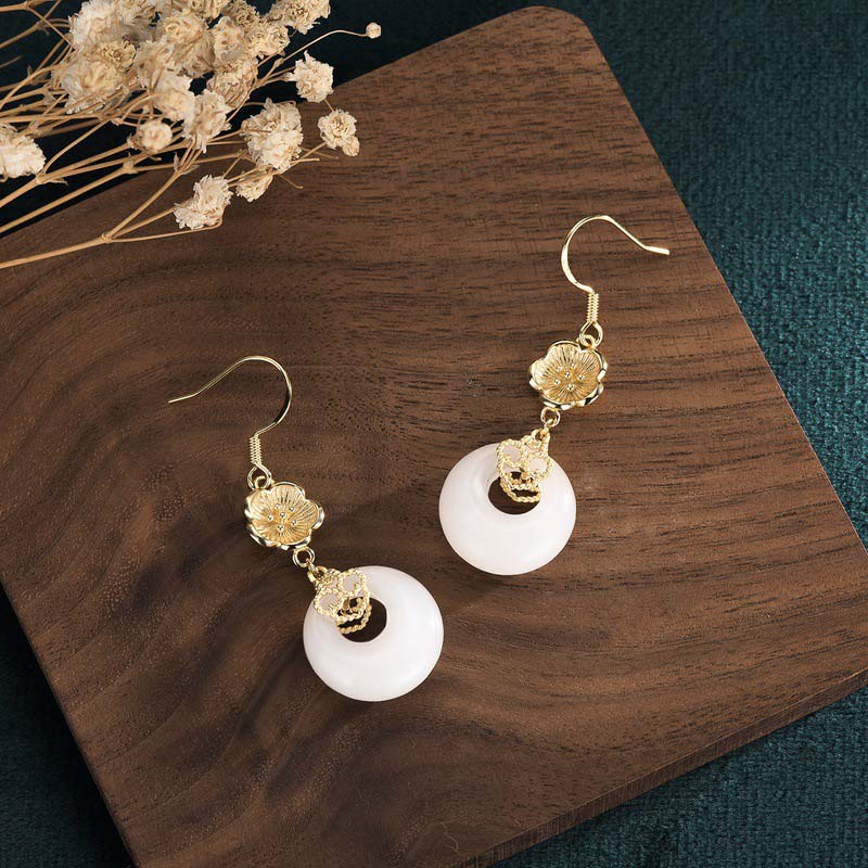 Boucles d'oreilles pendantes en jade blanc pour la protection et la chance