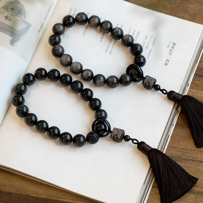 Mala de poignet en obsidienne argentée de 16 mm pour la protection et la sagesse