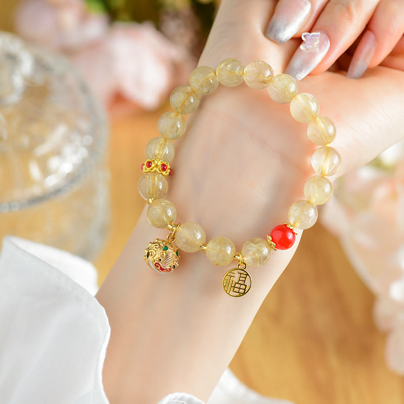 Bracelet de richesse en quartz rutile doré Fu Charm
