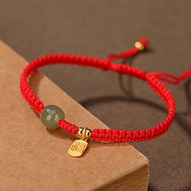 Bracelet réglable en jade Hetian rouge 7 x 8 mm