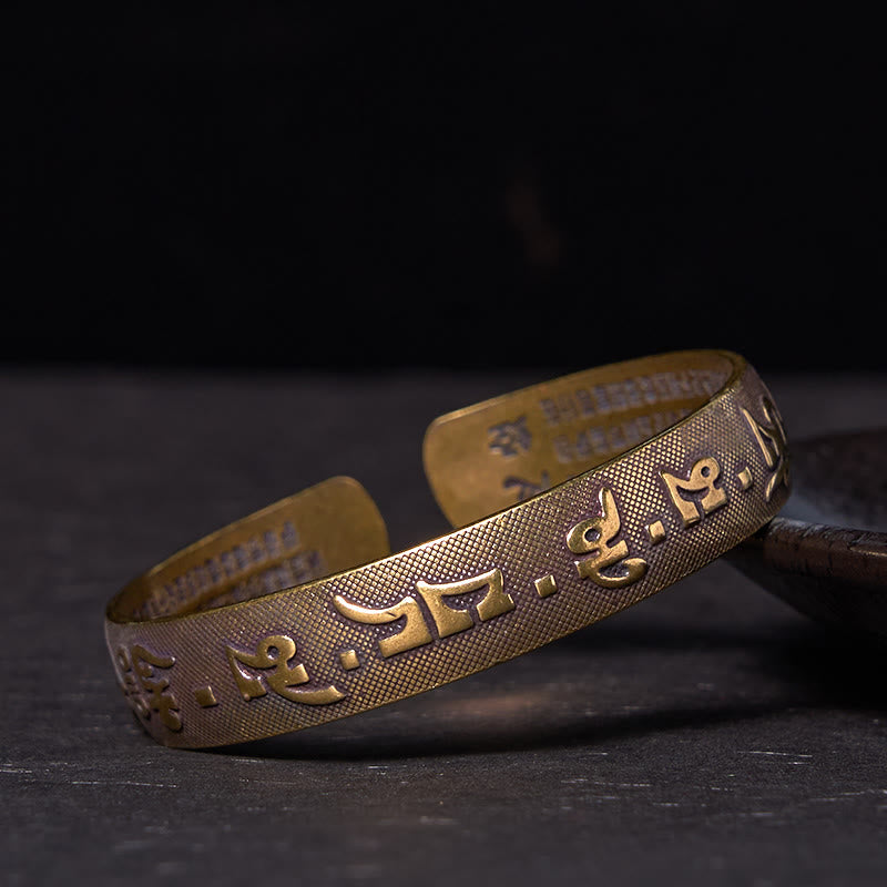 Bracelet réglable en cuivre Om Mani Padme Hum avec gravure du Sutra du Cœur