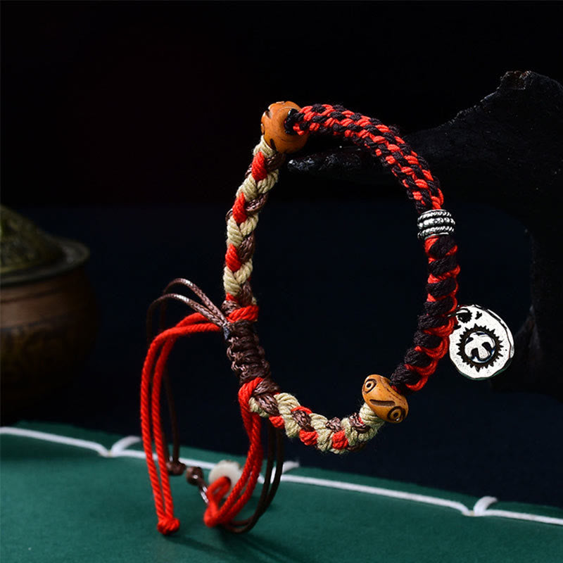 Bracelet Garuda réglable en fil rouge avec breloque en argent tibétain