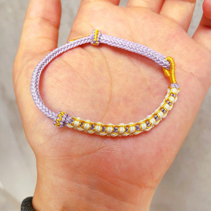 Bracelet tibétain réglable en fil d'or rouge avec nœud en fleur de pêcher