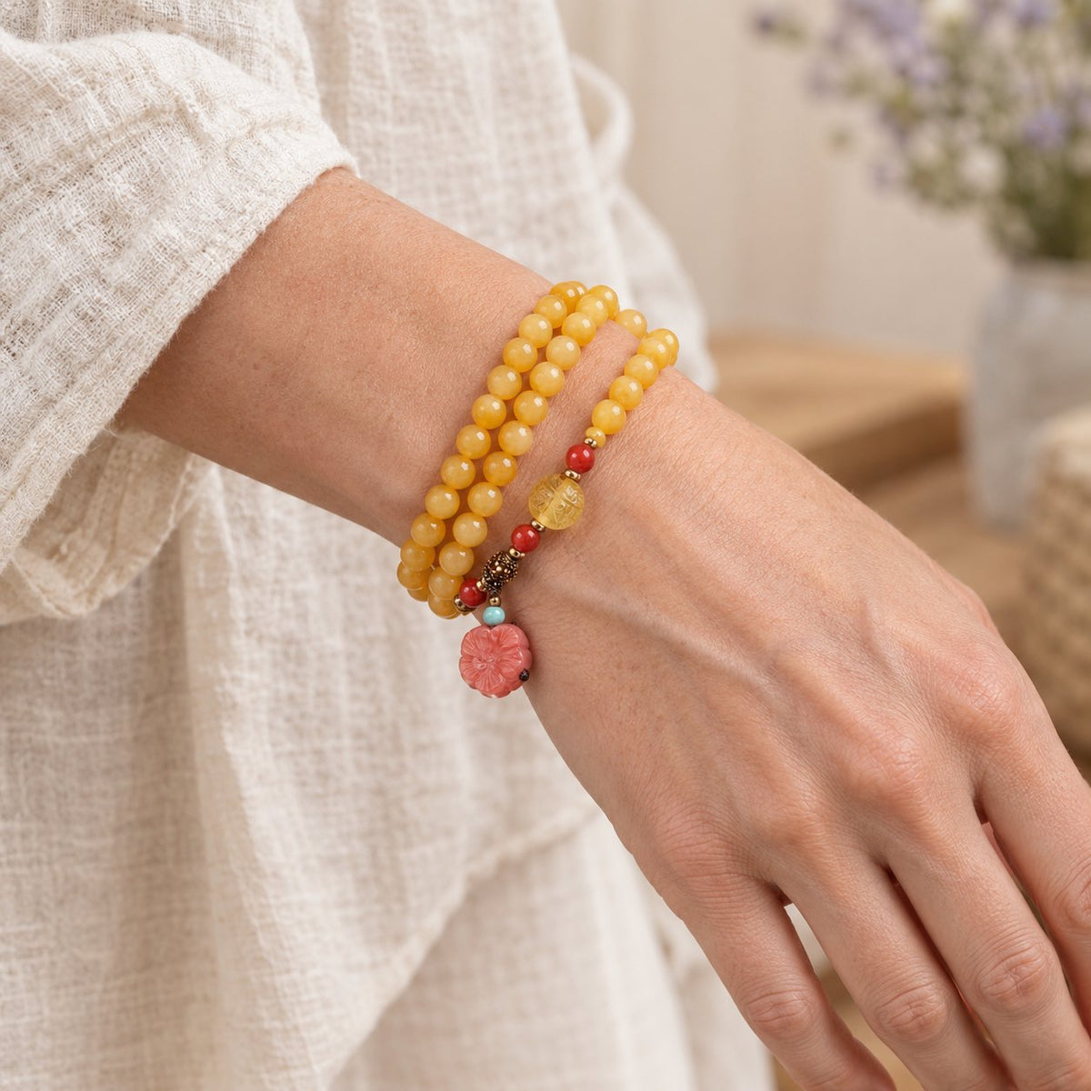 Amber Healing Balance Bracelet & Necklace, worn on the wrist by a woman