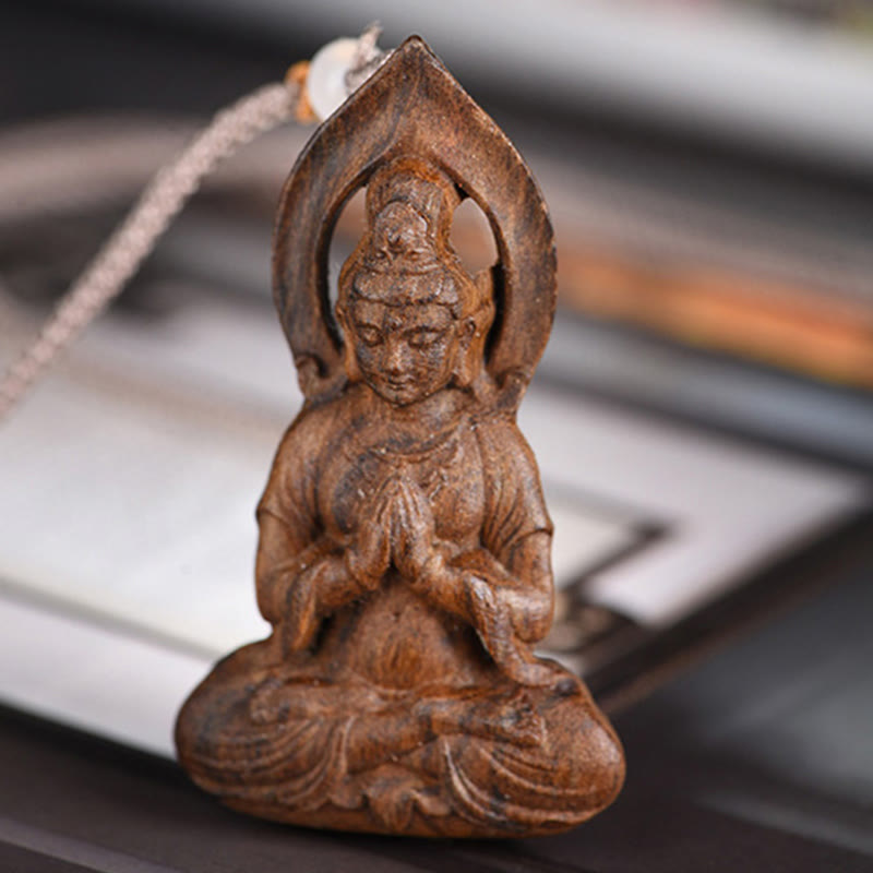 Collier pendentif paix en bois d'agar d'Avalokitesvara