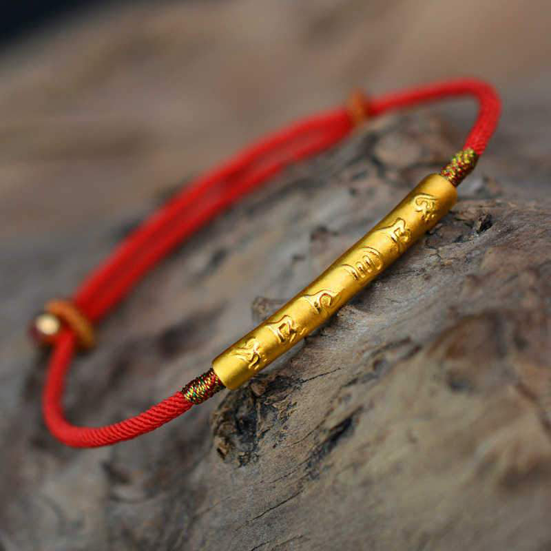 Bracelet porte-bonheur en argent et fil rouge Om Mani Padme Hum